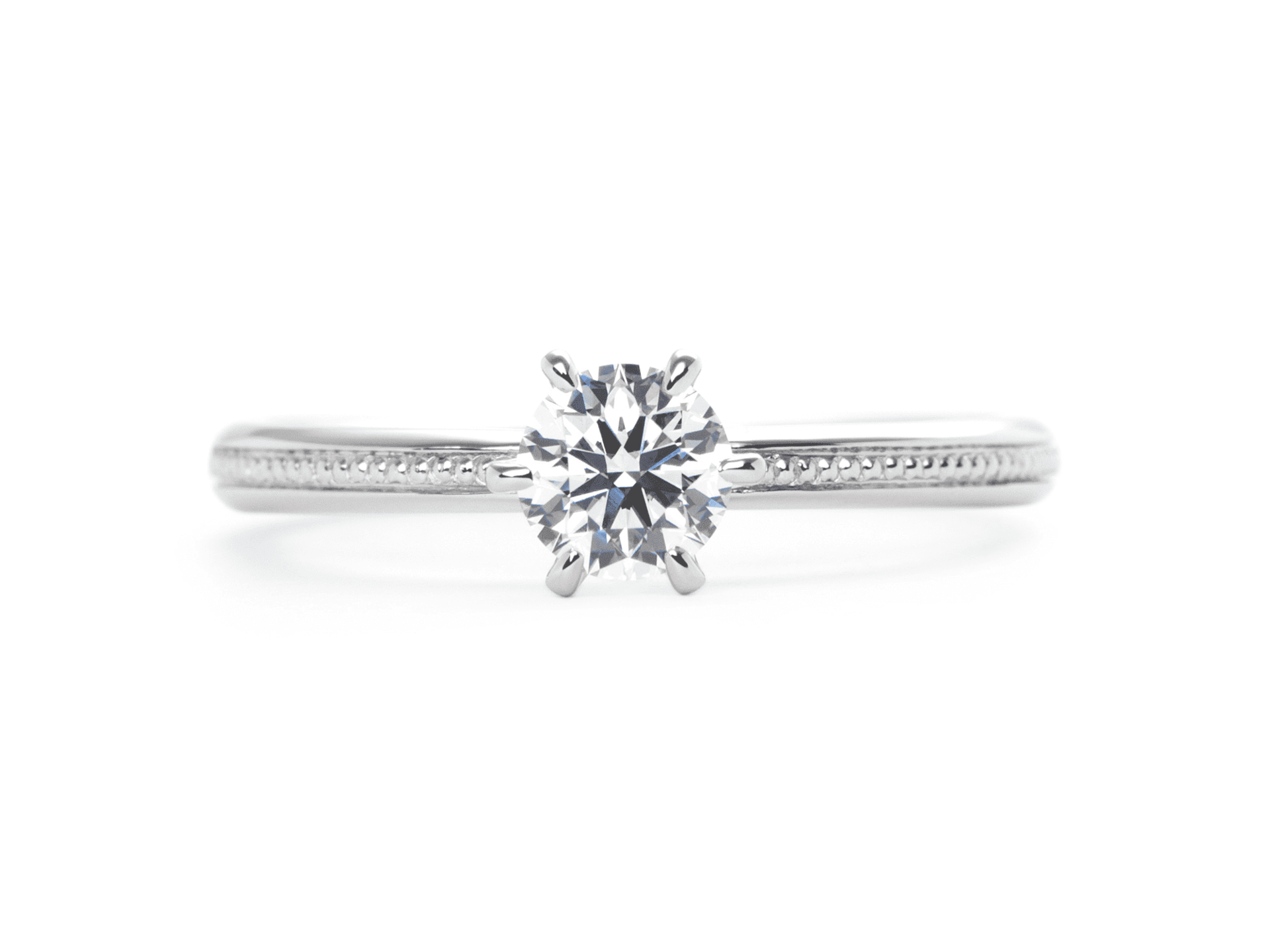 一列のミルラインが入ったソリティアのオーダーメイド婚約指輪 Hiroaki to Chiho