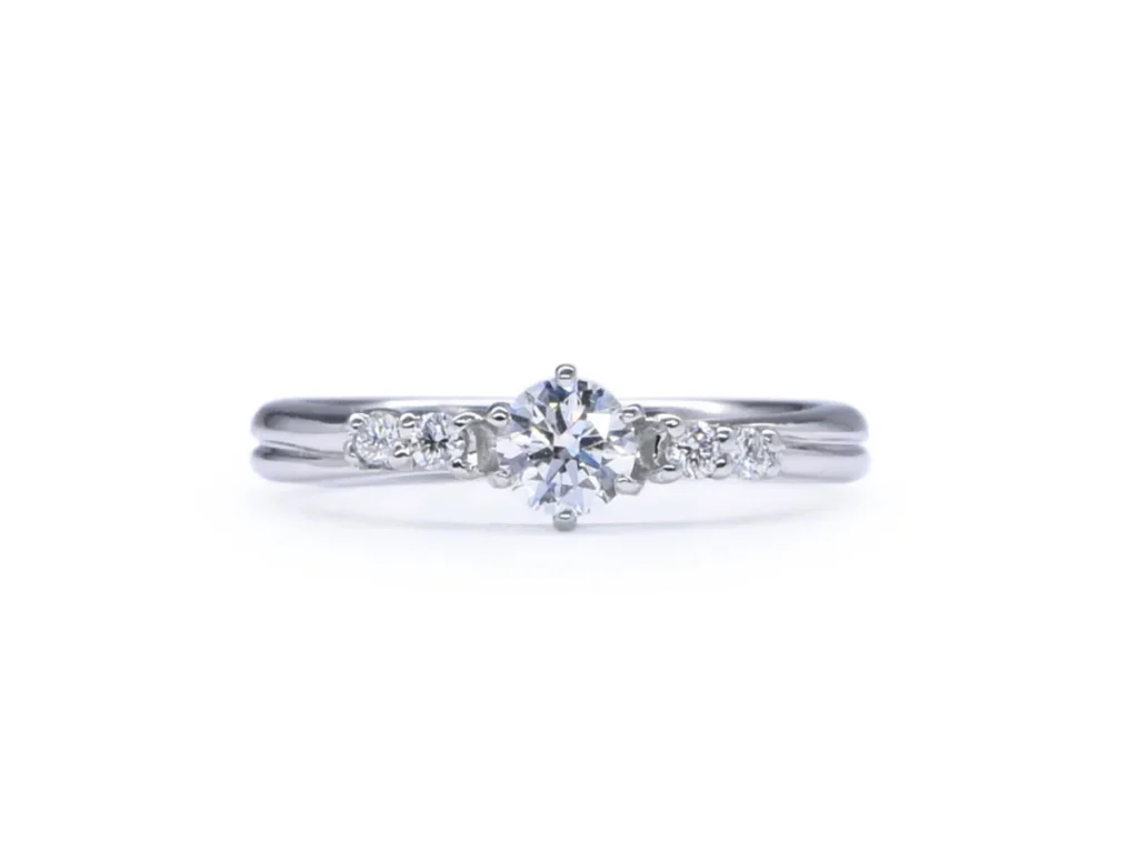 二連のようなフォルムにラインメレを施した手作り婚約指輪 Otsuki様