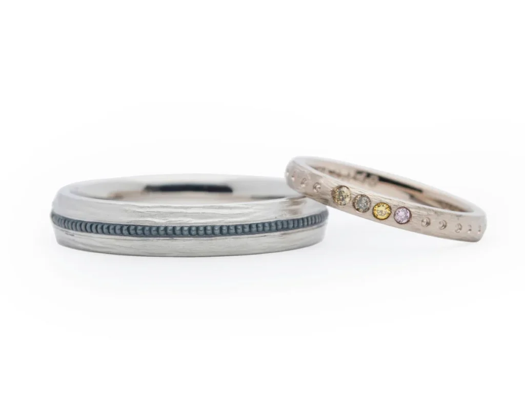 スタイリッシュなミルとダイヤがたくさん留まった手作り結婚指輪