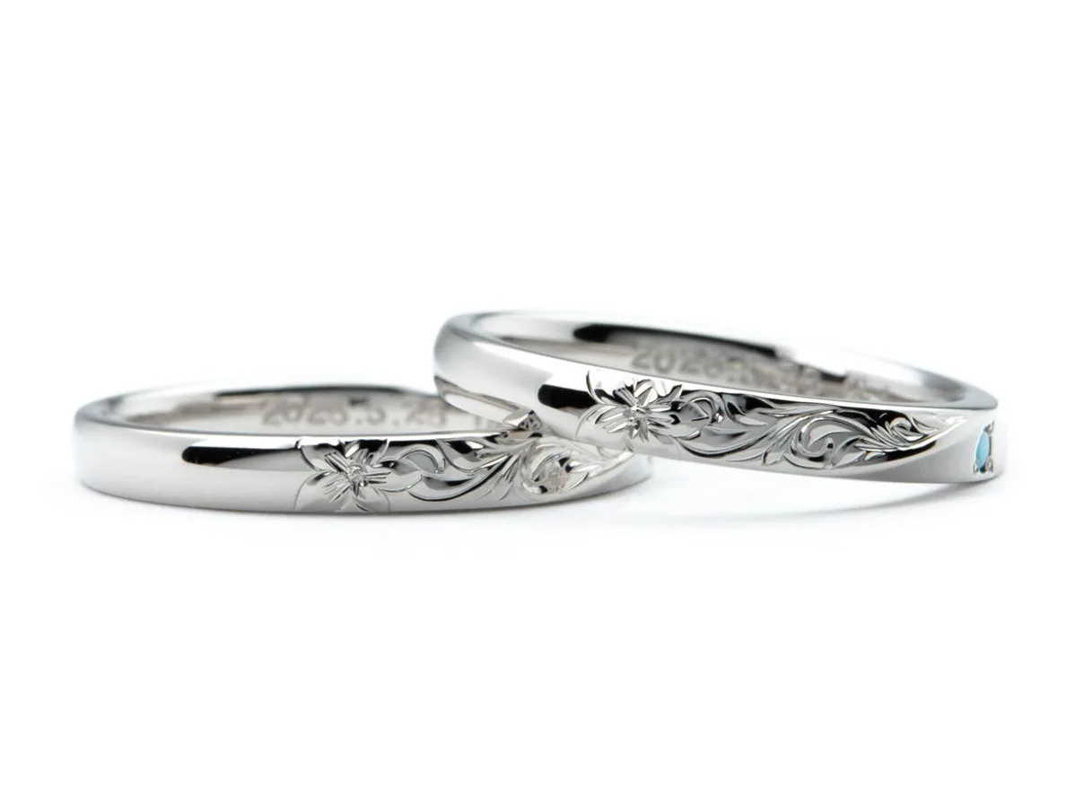 お互いの誕生石をお留めしたひねり×ハワイアン彫りの手作り結婚指輪 3