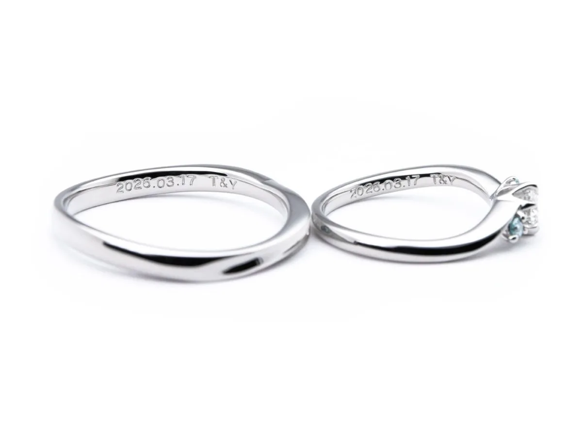 ブルーを取り入れたふたひねりと大きなダイヤがついたオーダーメイド結婚指輪 2